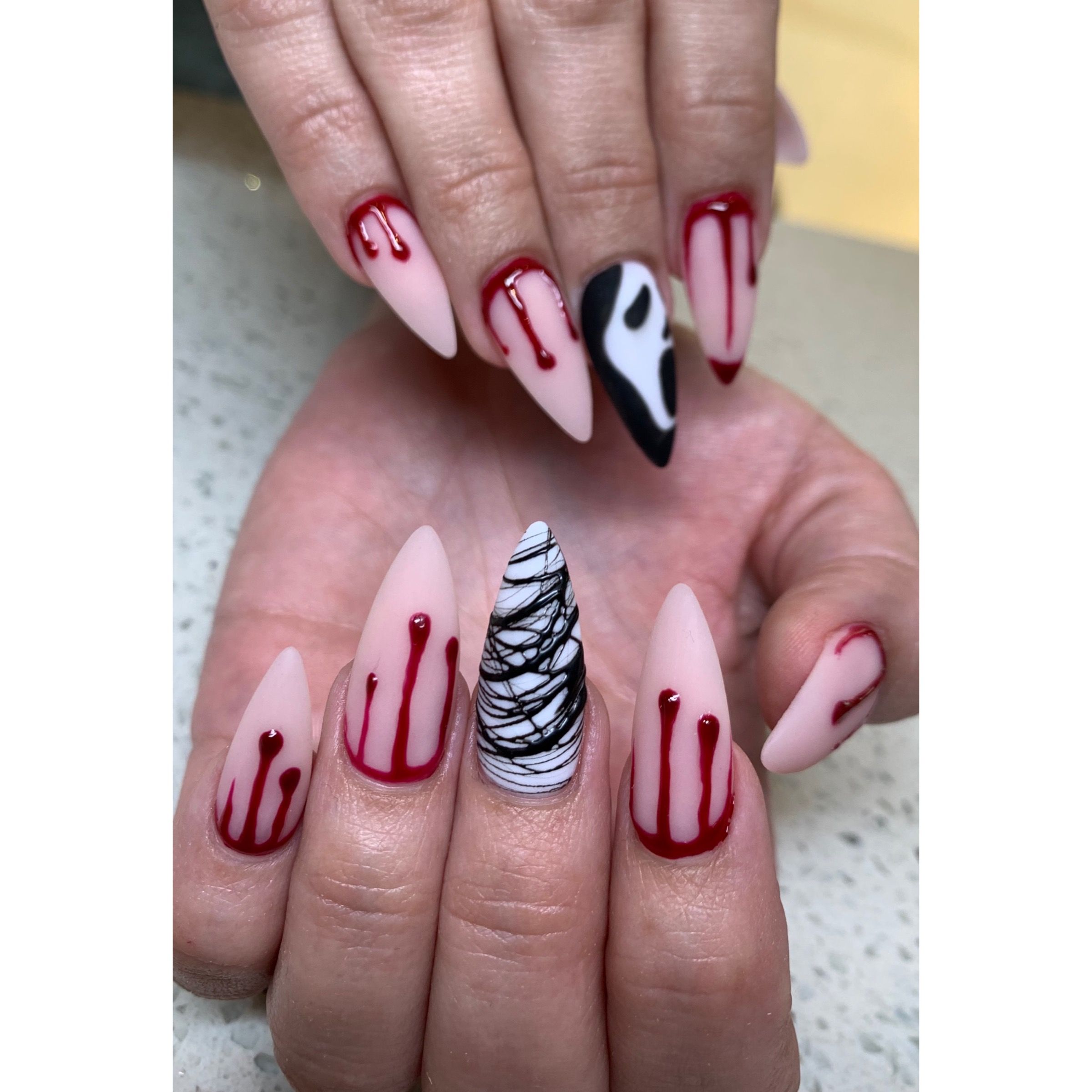 Hauntingly Enchanted: Nail Designs to Bewitch Your Halloween