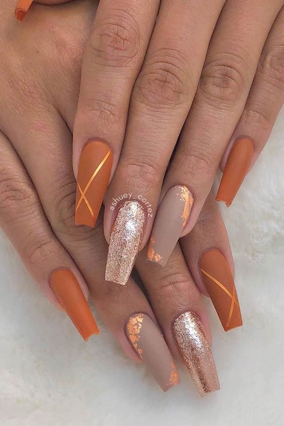 Autumn Whimsy: Cozy Nail Designs for a Season of Color