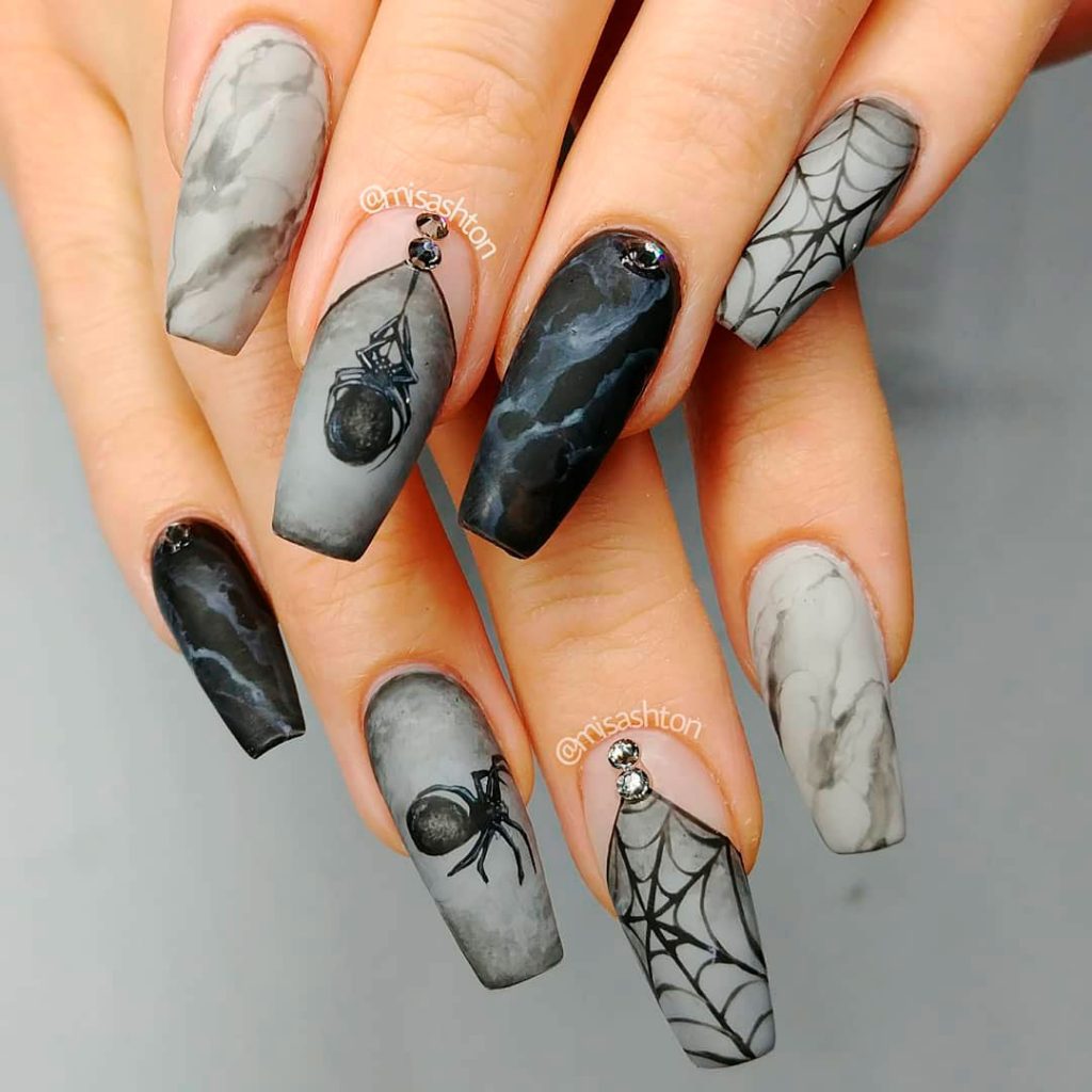 Webbed Whispers: Enchanting Halloween Nail Designs