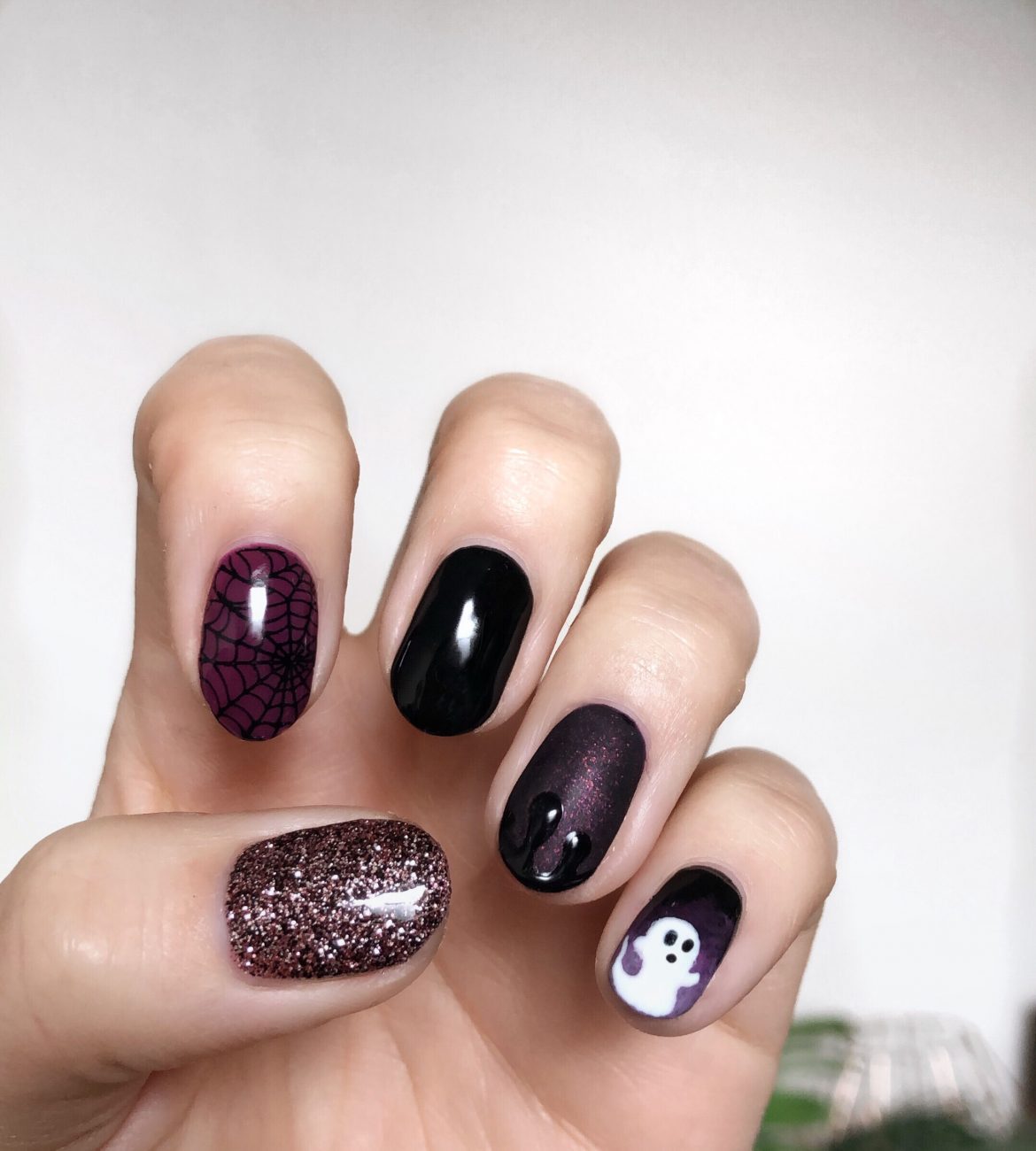 Hauntingly Chic: Enchanted Purple Halloween Nail Art