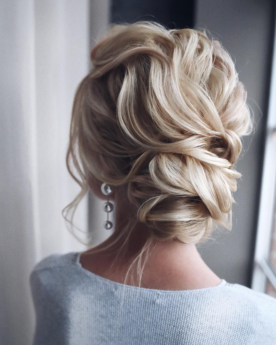 Elegance in Every Twist: The Perfect Updo for Homecoming Glam!