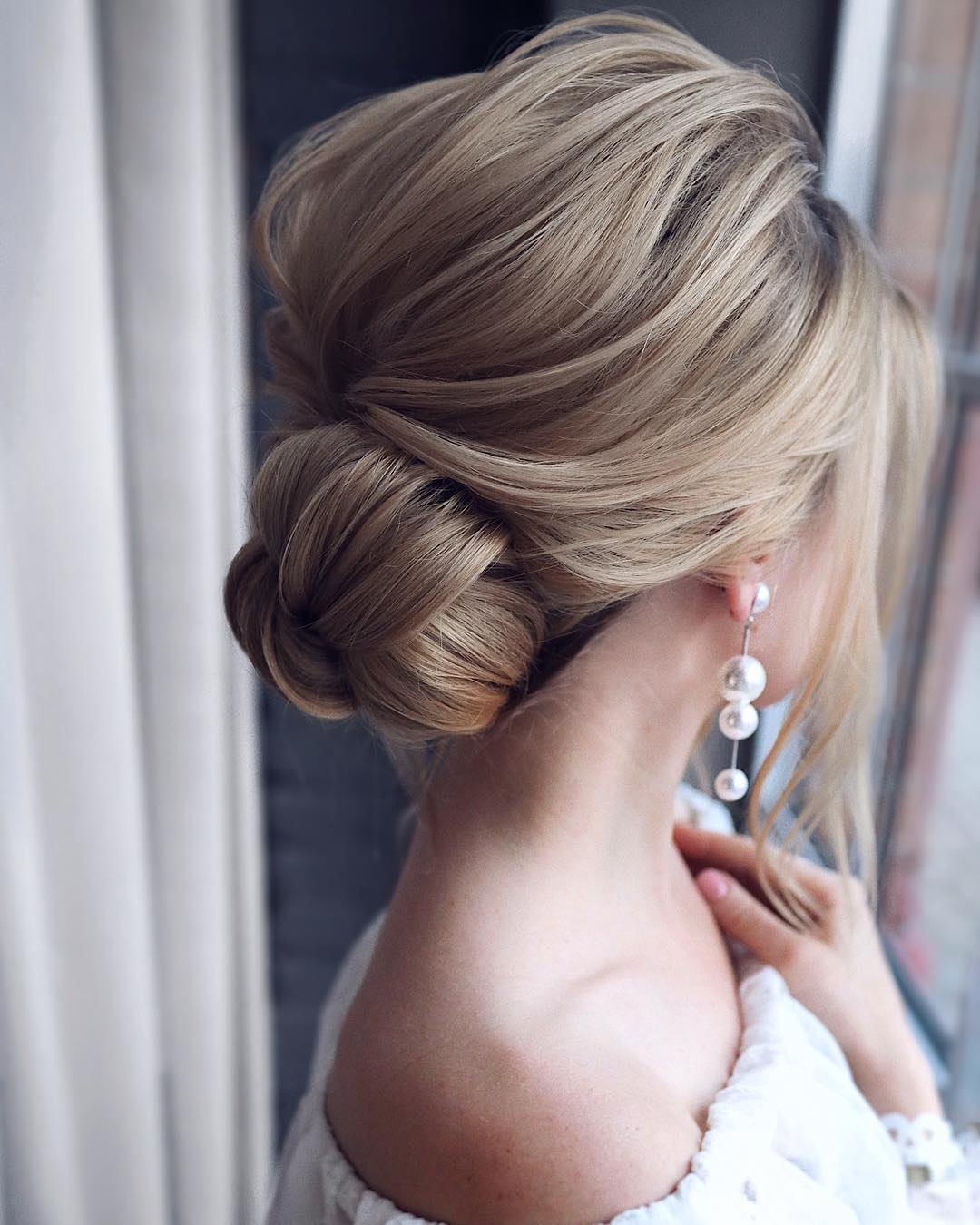 Elegantly Enchanted: The Perfect Updo for Unforgettable Homecoming Nights!