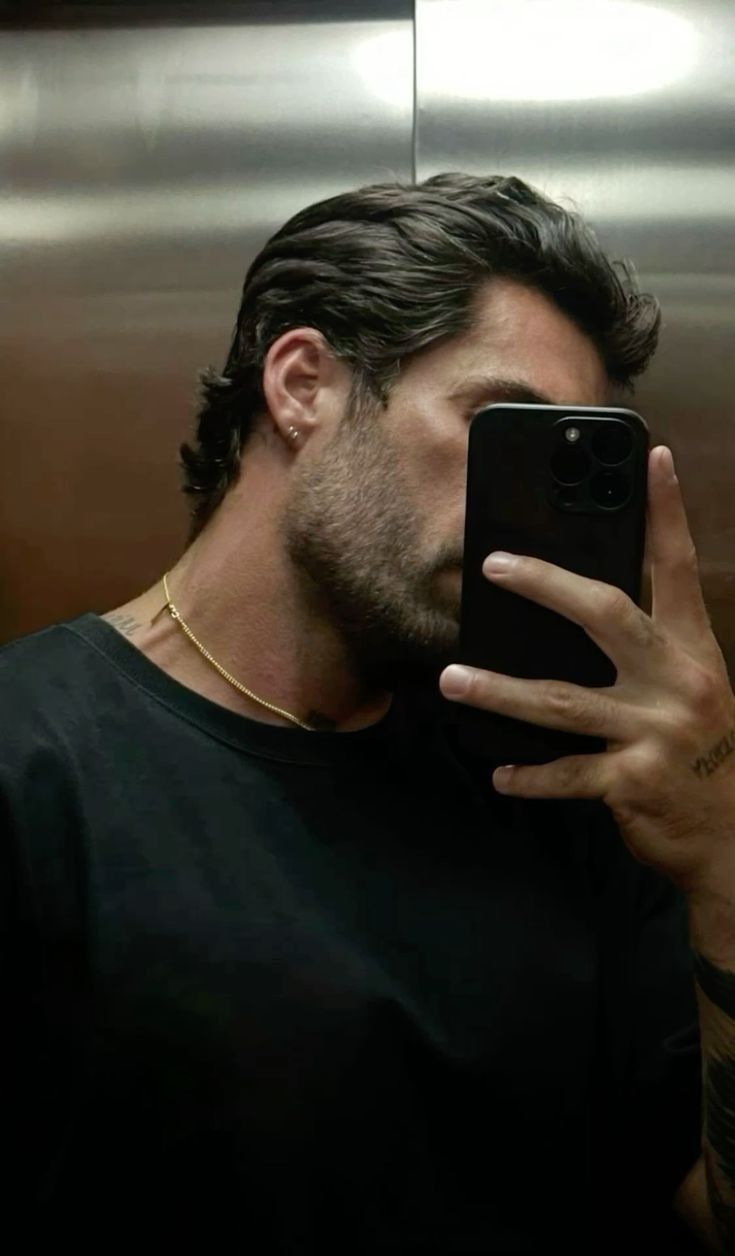 Mid-Back Ponytail With Natural Waves Mid-Back Ponytail With Natural Waves — Winter Hairstyles for Men