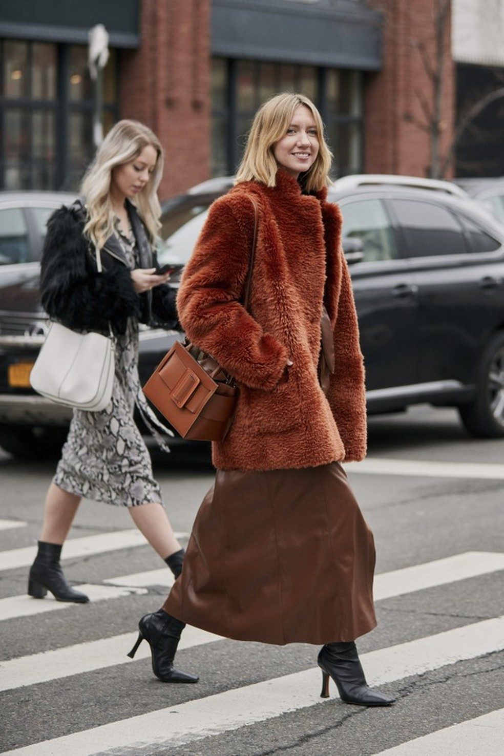Burnt Orange Teddy Coat Over a Black Turtleneck and Leather Skirt — Teddy Coat Outfits