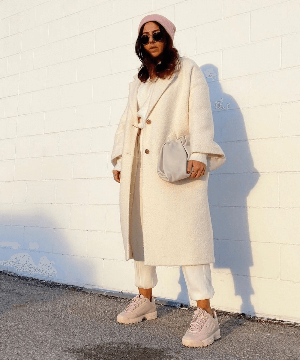Chic Cream Knit Athleisure with Boucle Coat — Winter Athleisure Outfits