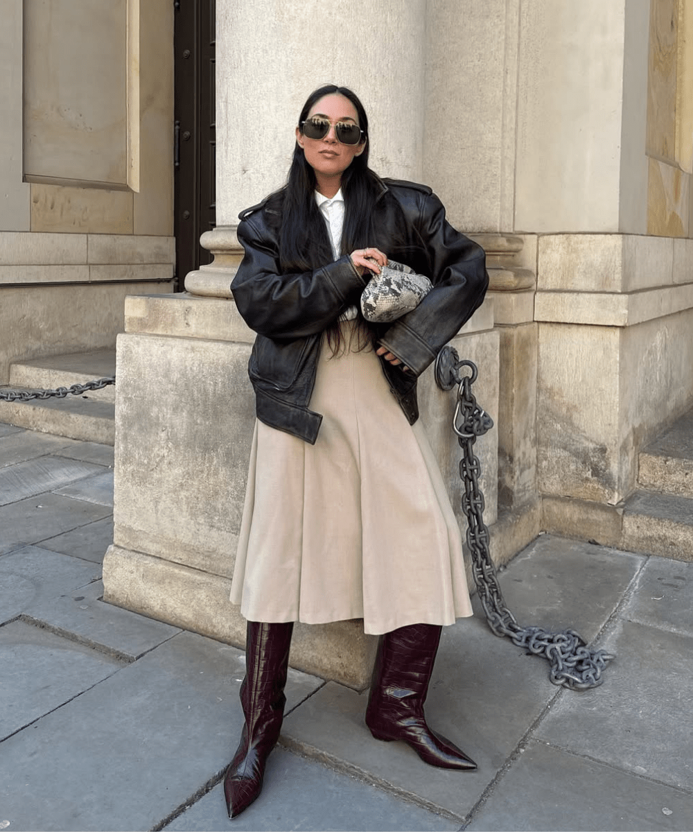Beige Pleated Skirt with Leather Jacket and Knee-High Boots — Winter Skirt Outfits