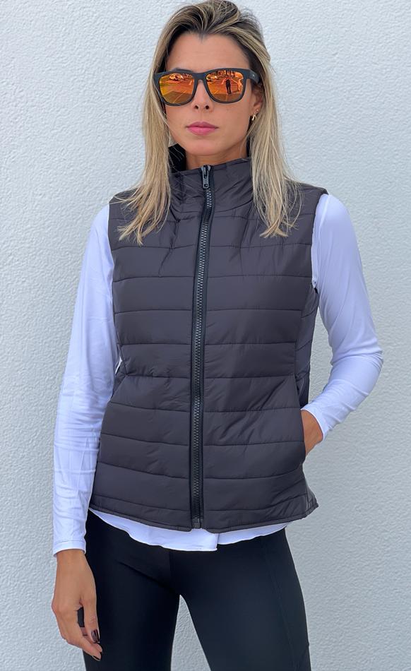 Navy Puffer Vest with Light Grey Top and Blue Pants — Puffer Vest Outfits