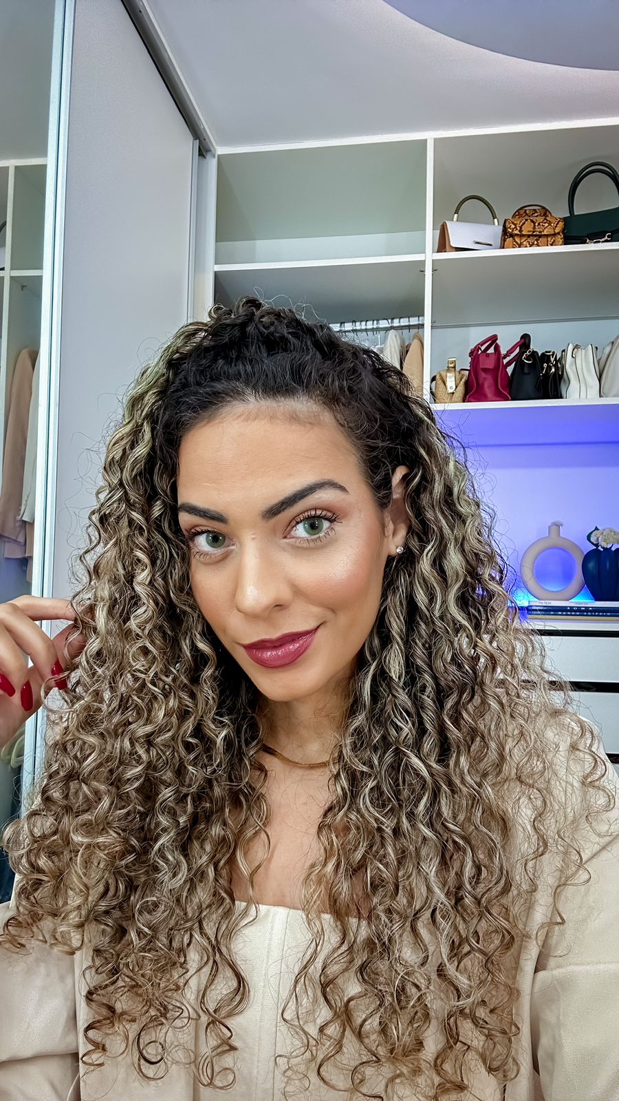 Visual Idea — The Hair Is Styled In Loose Visual Idea — The Hair Is Styled In Loose — Winter Hairstyles for Curly Hair