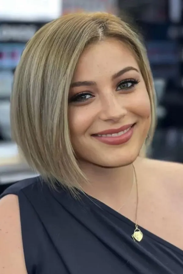 The Angled Ash Blonde Bob — Winter Hairstyles for Round Faces