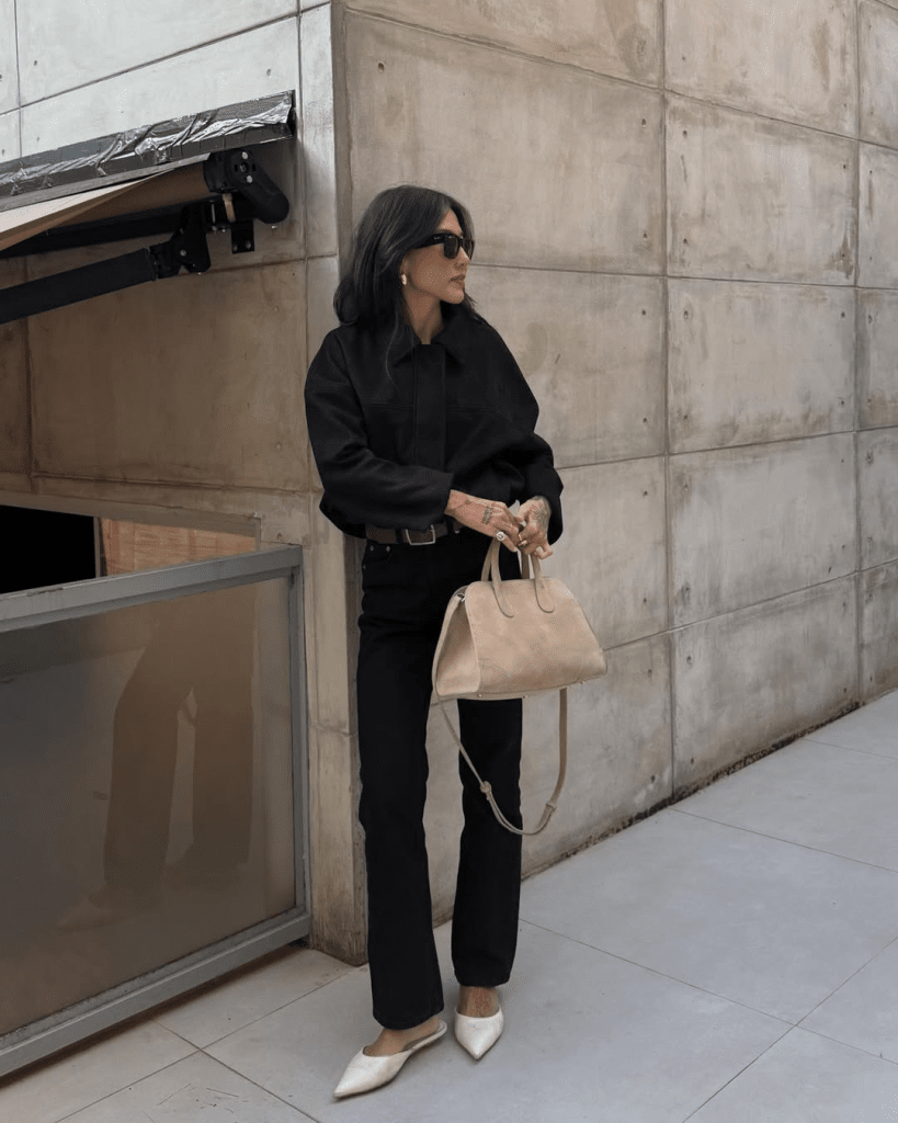 All-Black Ensemble with Beige Handbag — Classy Winter Outfits