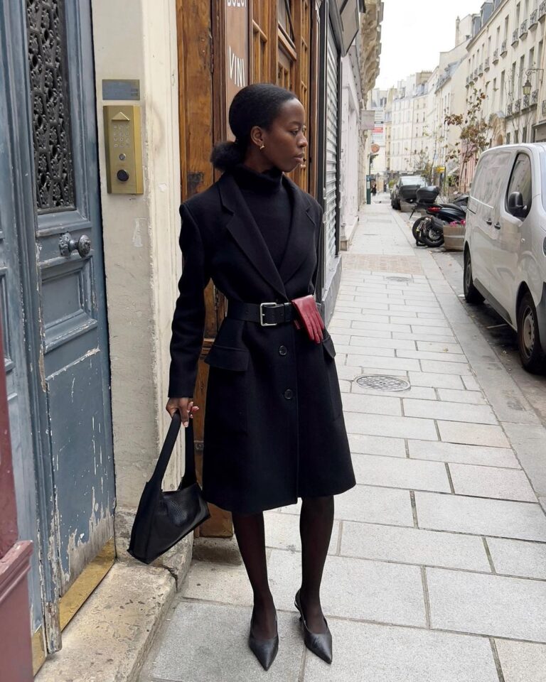 Black Belted Coat with Red Gloves for a Pop of Color — Long Coat Outfits