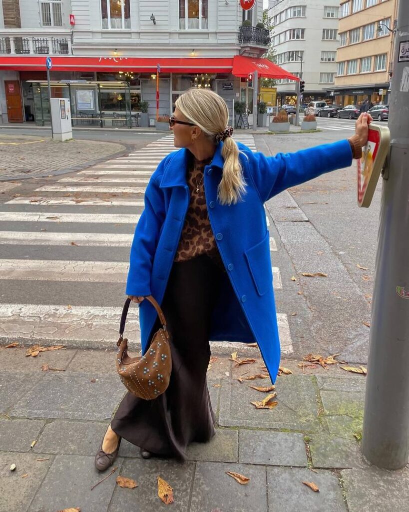 Vibrant Blue Coat Over Leopard Top and Flowing Skirt Vibrant Blue Coat Over Leopard Top and Flowing Skirt — Winter Layering Outfits
