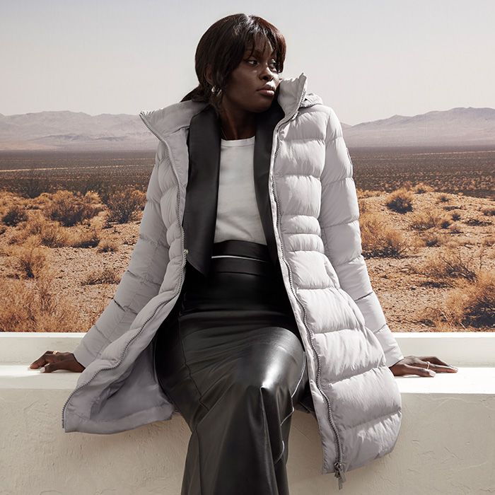 Light Grey Puffer Jacket with White T-Shirt and Black Leather Skirt — Parka Outfits