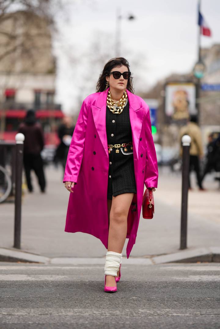 Striking Hot Pink Trench Coat with White Leg Warmers and Black Dress — Leg Warmers Outfits