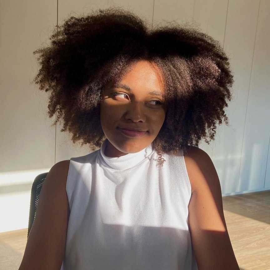 Voluminous Shoulder-Length Afro Voluminous Shoulder-Length Afro — Winter Hairstyles for Black Women