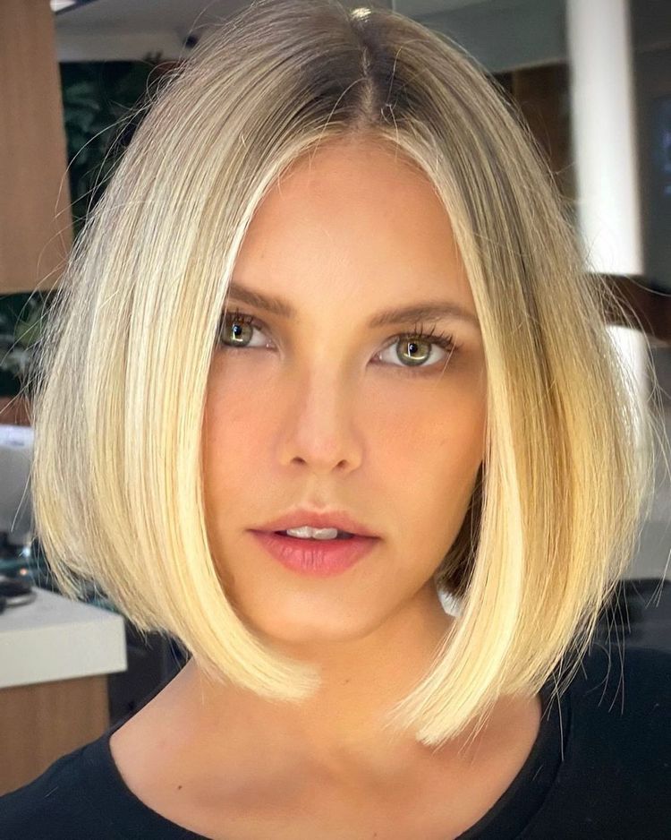 Asymmetrical Pixie With Swept Bangs Asymmetrical Pixie With Swept Bangs — Winter Haircuts for Square Faces