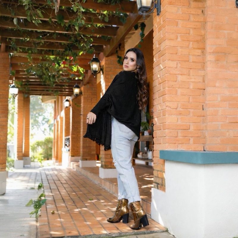 Fringed Knit Poncho with Straight-Leg Jeans — Boho Winter Outfits