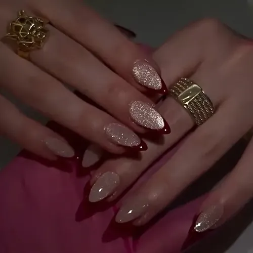 Sheer Nude Deep Red Glitter Stilettos Sheer Nude Deep Red Glitter Stilettos — Winter Stiletto Nails