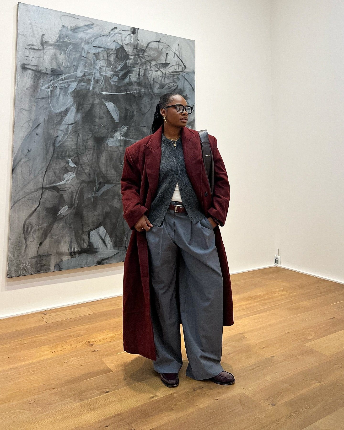 Sophisticated Burgundy Coat Over Knit Vest and Trousers Sophisticated Burgundy Coat Over Knit Vest and Trousers — Winter Layering Outfits