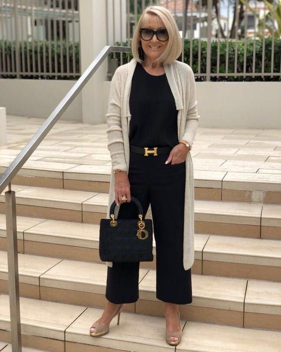 Red Sweatshirt Layered over White Shirt with Striped Cropped Pants — Winter Outfits for Women Over 60