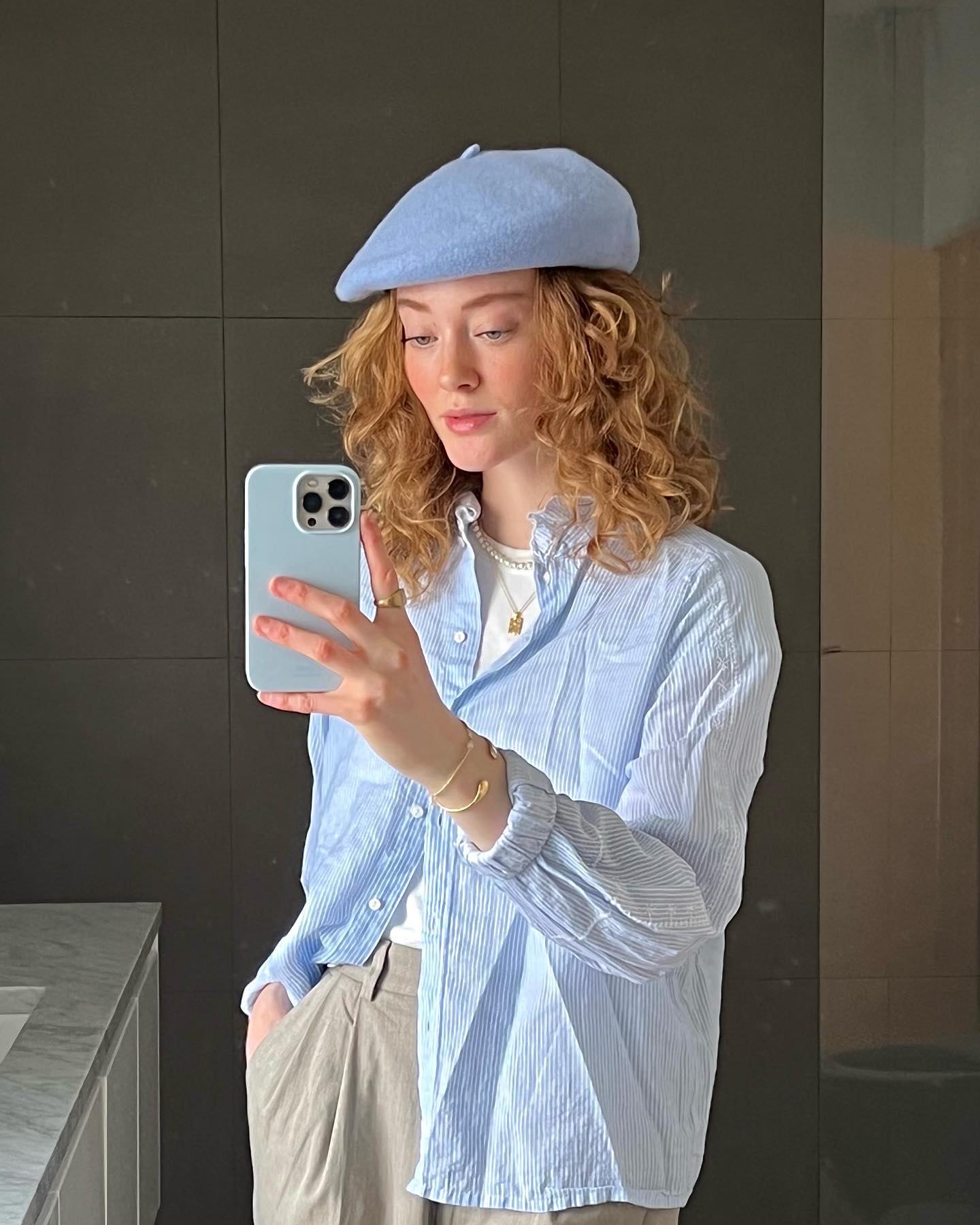 Curly Strawberry Blonde With Blue Beret — Winter Hat Hairstyles