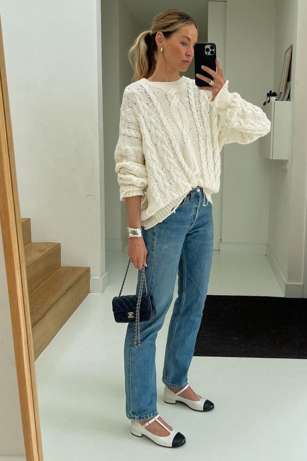 Chunky White Cable-Knit Sweater with Blue Straight-Leg Jeans — Casual Winter Outfits