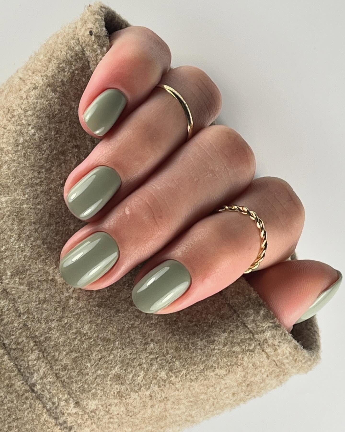 Muted Sage Green Glossy Short Oval Nails Muted Sage Green Glossy Short Oval Nails — Winter Nail Colors for Pale Skin