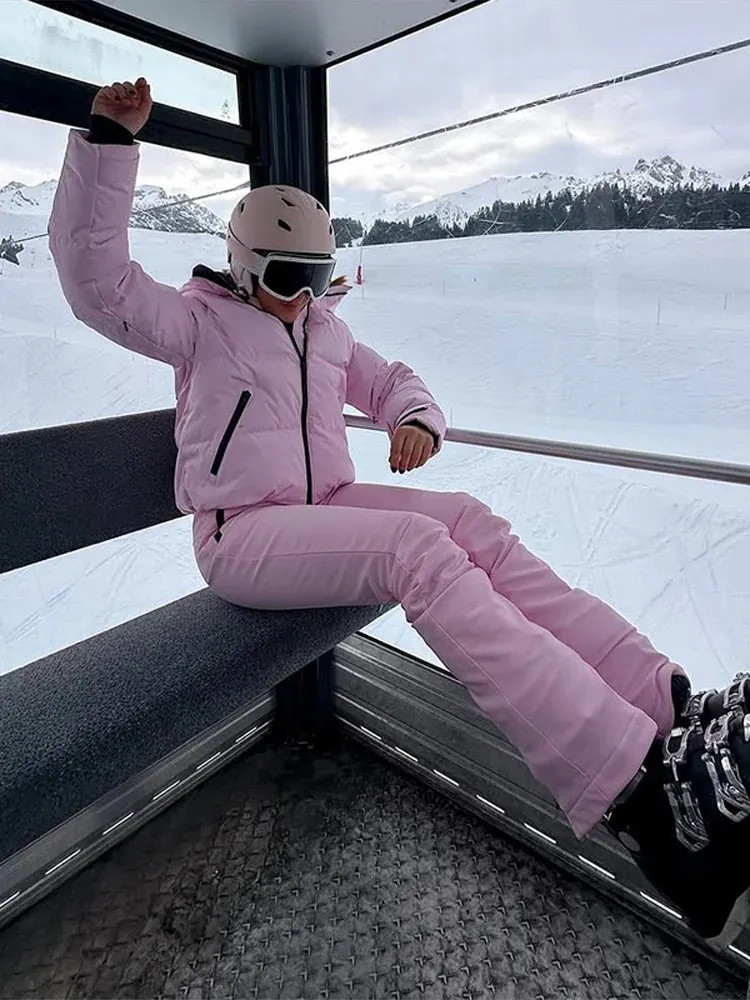 Vibrant Pink Puffer Ski Suit for a Bold Winter Statement Vibrant Pink Puffer Ski Suit for a Bold Winter Statement — Ski Outfits