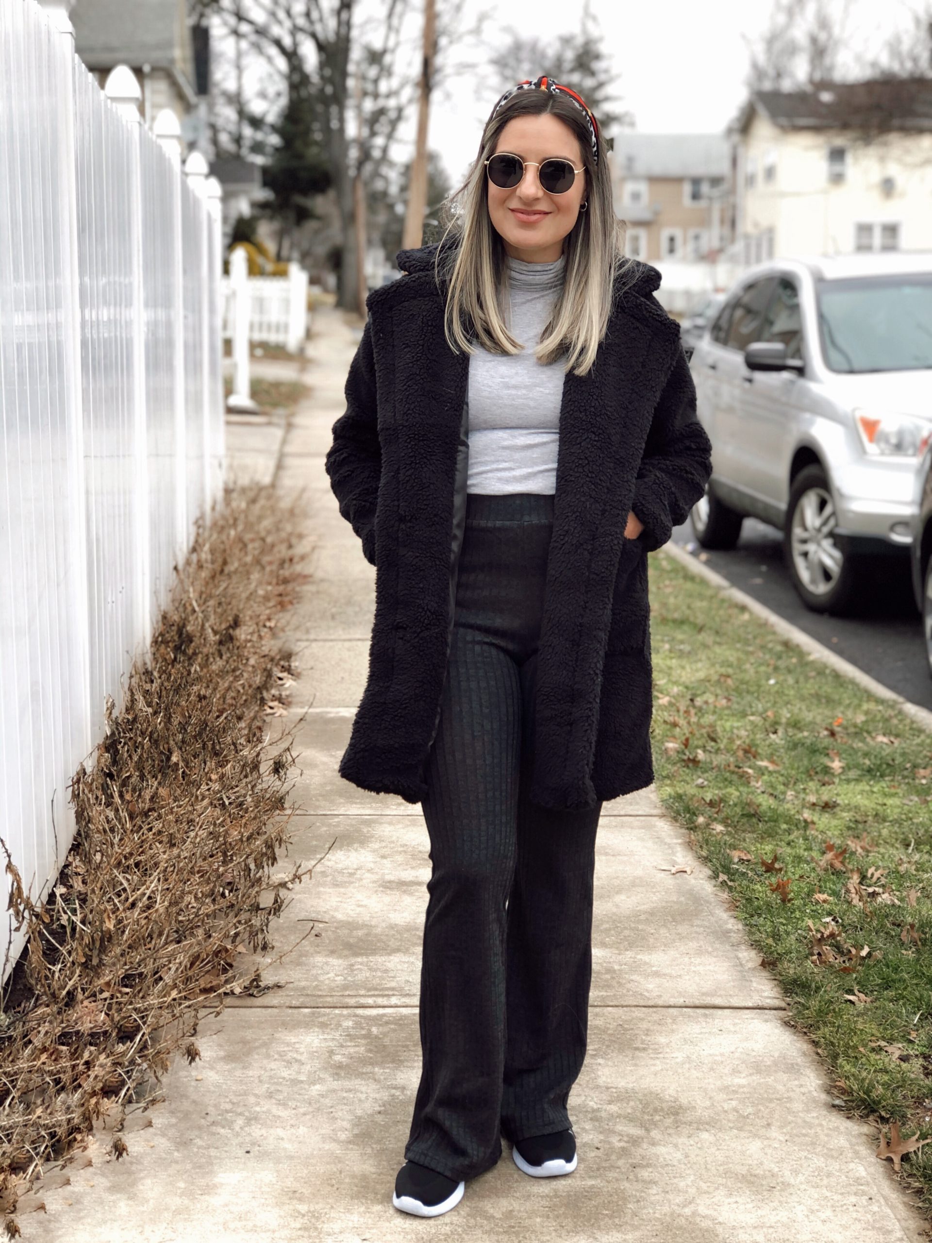 Cozy Black Teddy Coat with Patterned Flared Pants — Black Coat Outfits
