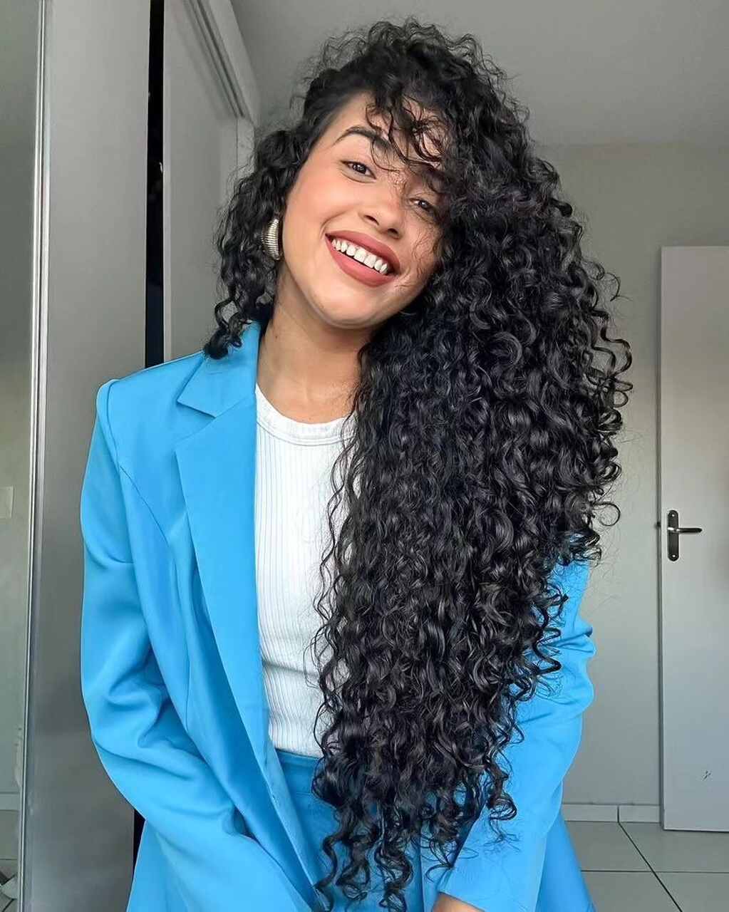 Mid-Back Visual Idea — Winter Haircuts for Curly Hair