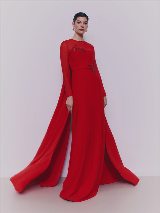 Dramatic Red Crepe Gown with Flowing Cape for Formal Parties — Winter Party Outfits