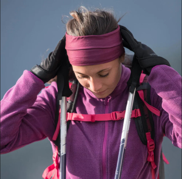 Purple Fleece Jacket with Hiking Poles and Pink Accents — Winter Hiking Outfits