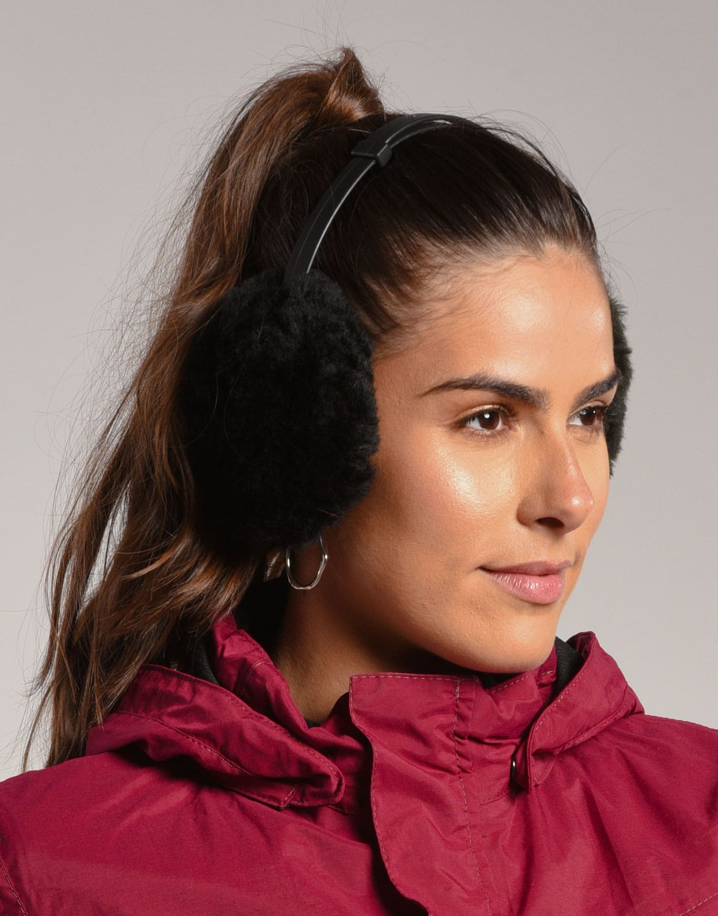 Fluffy Black Earmuffs Paired with a Vibrant Red Hooded Jacket Fluffy Black Earmuffs Paired with a Vibrant Red Hooded Jacket — Earmuffs Outfits