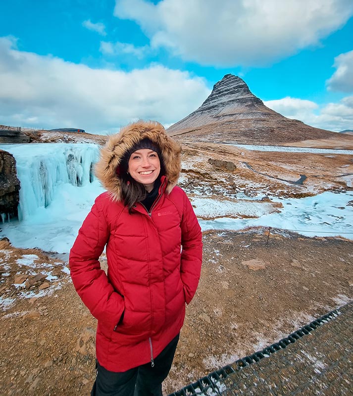 Vibrant Red Puffer Jacket for Snowy Landscapes — Iceland Winter Outfits