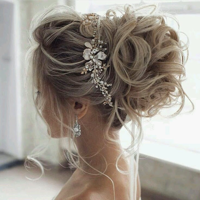 Ash Blonde Updo With Floral Accessory — Winter Wedding Hairstyles
