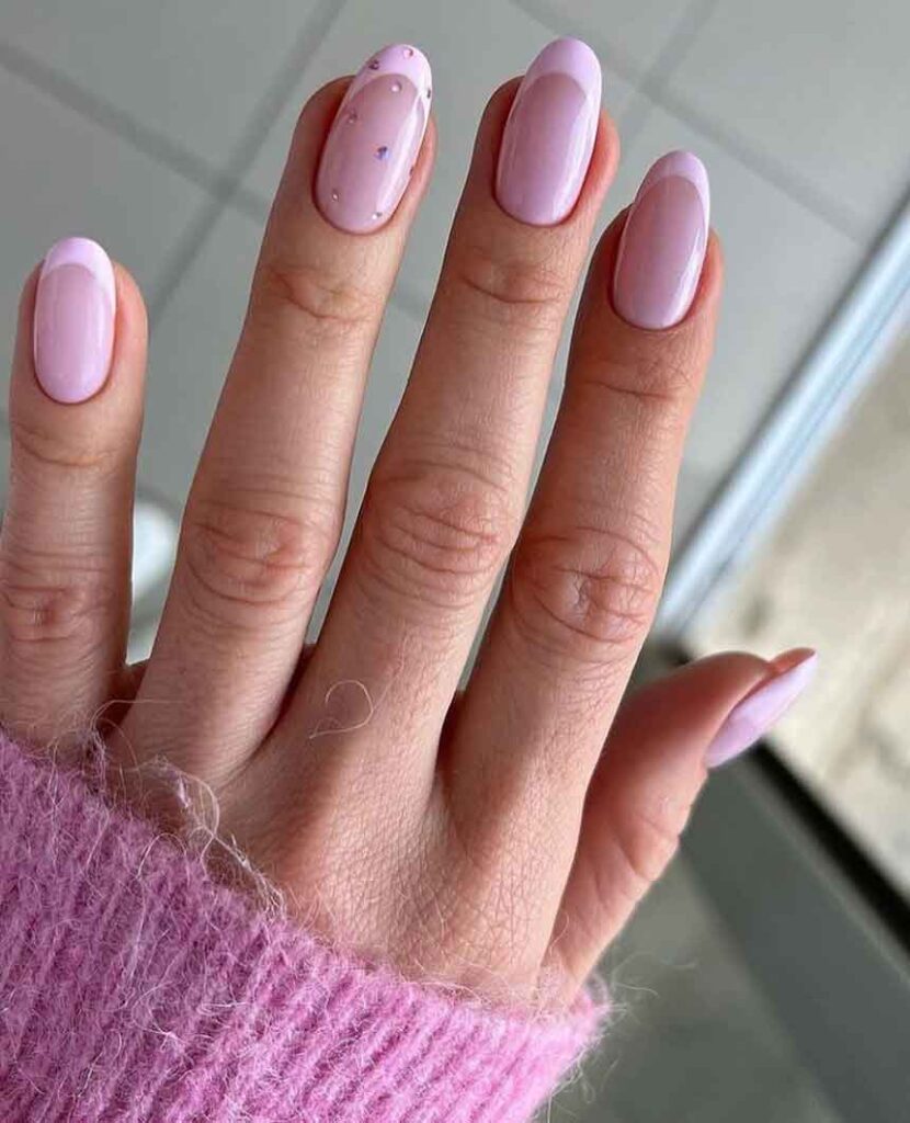Pale Pink French Tip with Iridescent Glitter Pale Pink French Tip with Iridescent Glitter — Winter Nail Colors for Women Over 50