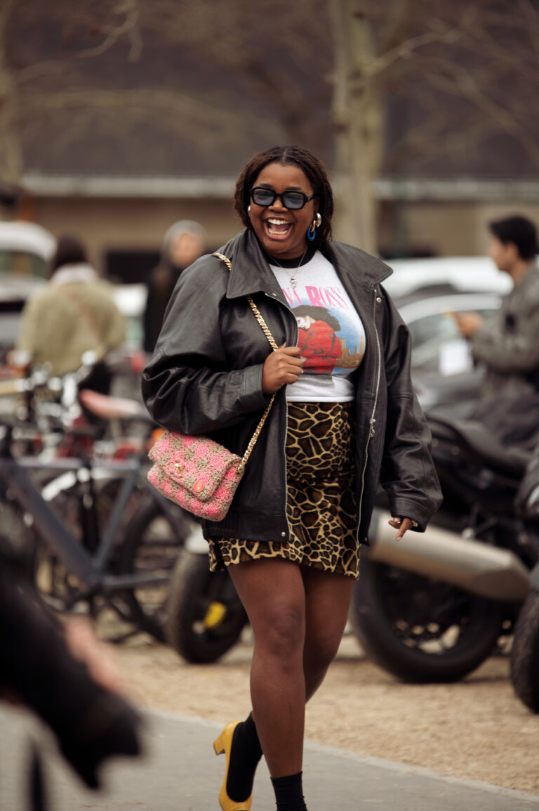 Multicolor Plaid Coat Over Orange Sweater for a Cheerful Winter Ensemble — Colorful Winter Outfits