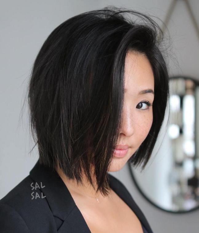 Dark Brown The Sleek Tucked Chin Bob — Winter Hairstyles for Round Faces