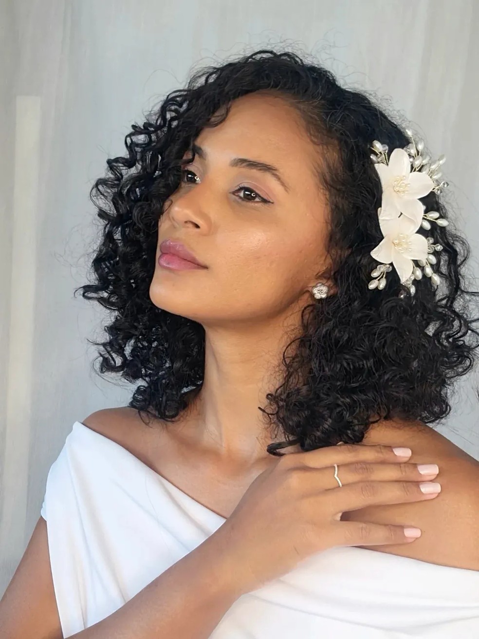 Black Natural Curls With Floral Hairpiece — Winter Wedding Hairstyles