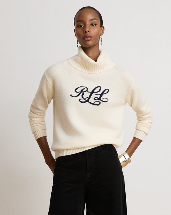 Cream Turtleneck Sweater with Embroidered Logo and Black Trousers — Turtleneck Outfits