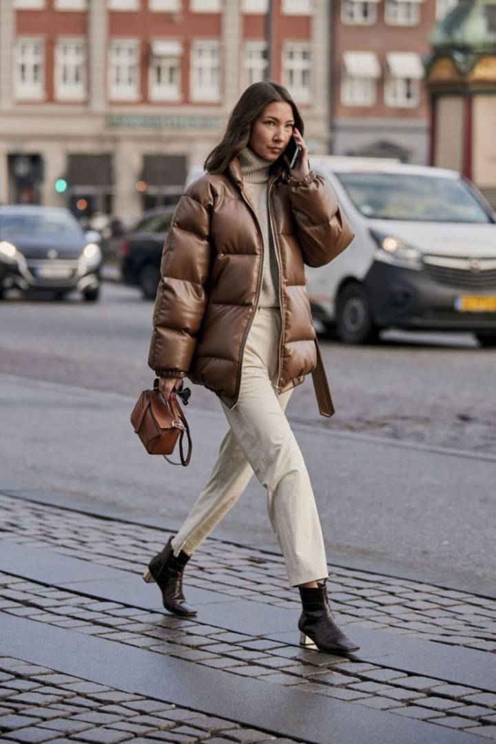 Brown Leather Puffer Jacket with Turtleneck and Cream Trousers — Winter Puffer Jacket Outfits