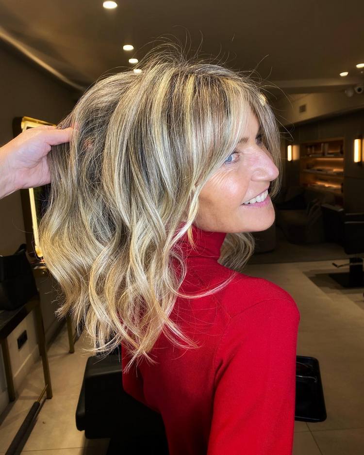 Angled Bob With Side Swept Bangs Angled Bob With Side Swept Bangs — Winter Hairstyles for Women Over 40