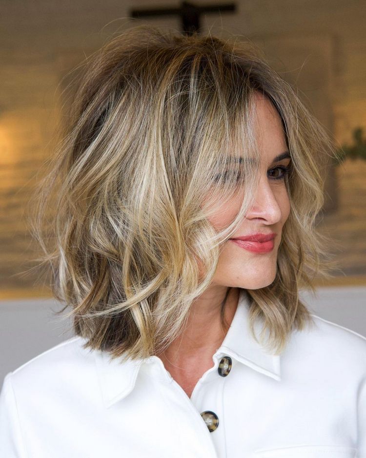 Layered Shag With Full Bangs — Styled To Emphasize Choppy Layers Layered Shag With Full Bangs — Styled To Emphasize Choppy Layers — Winter Haircuts for Square Faces