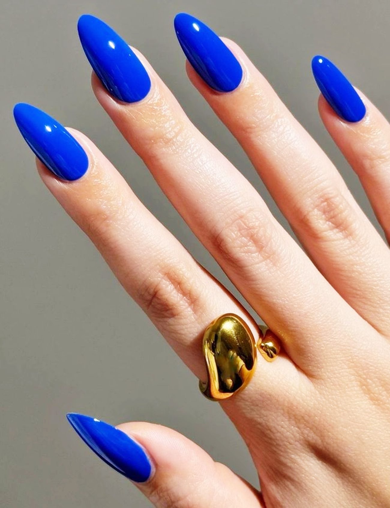 Vibrant Royal Blue Glossy Stilettos — Winter Blue Nails