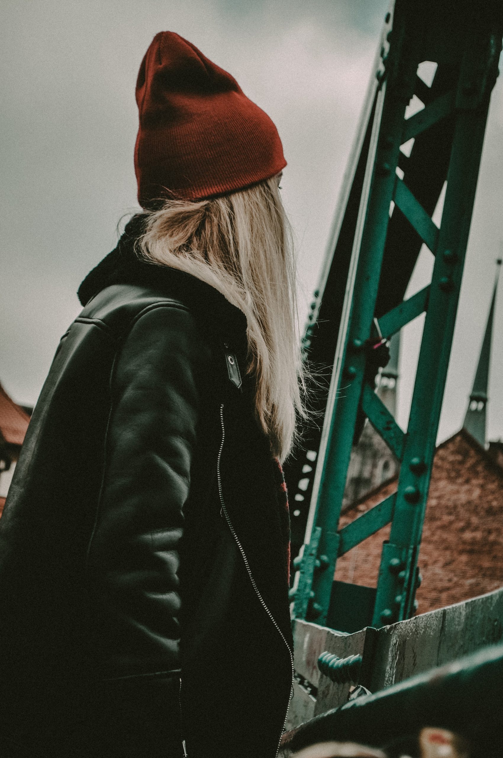 Straight Ash Blonde Under Red Beanie — Winter Hat Hairstyles
