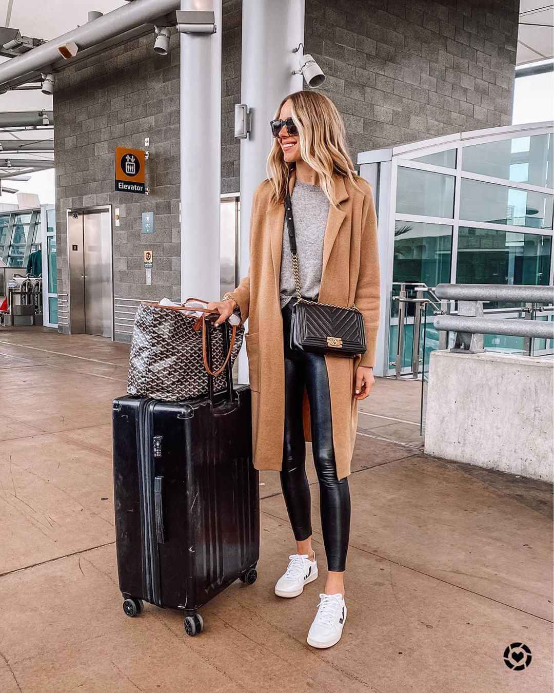 Oversized Brown Knit Sweater Over White Long-Sleeve Shirt and Black Leggings — Winter Airport Outfits