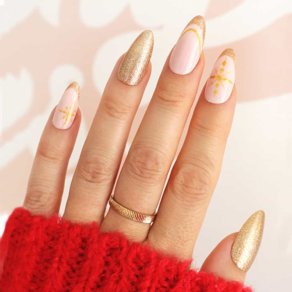 Gold Glitter French Tips with Pearl Accents Almond Nails Gold Glitter French Tips with Pearl Accents Almond Nails — Winter Almond Nails