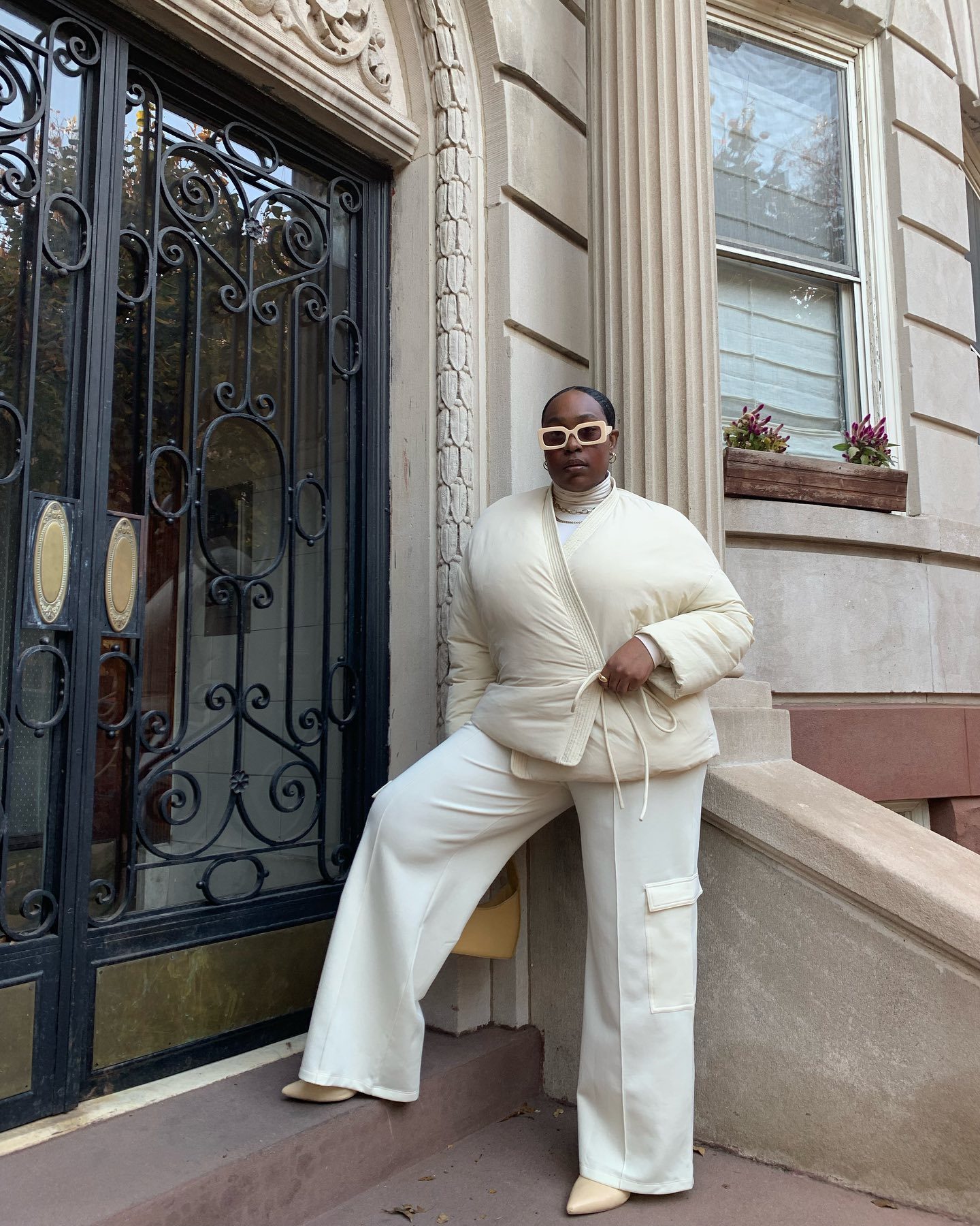 Cream Puffer Jacket with Tie Waist and Wide-Leg Pants — NYC Winter Outfits