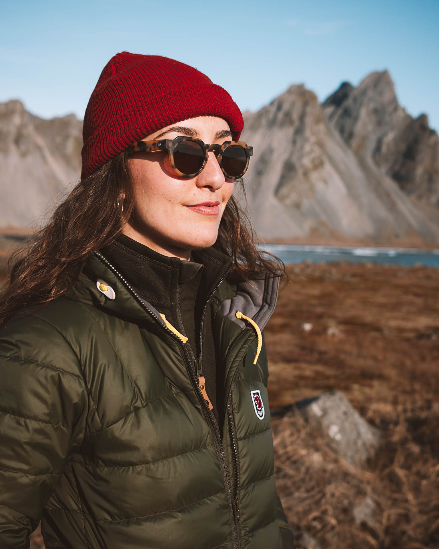 Fitted Olive Green Puffer with a Pop of Red — Iceland Winter Outfits
