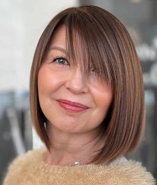 Sharp Chin Bob With Blunt Bangs Sharp Chin Bob With Blunt Bangs — Winter Hairstyles for Women Over 60